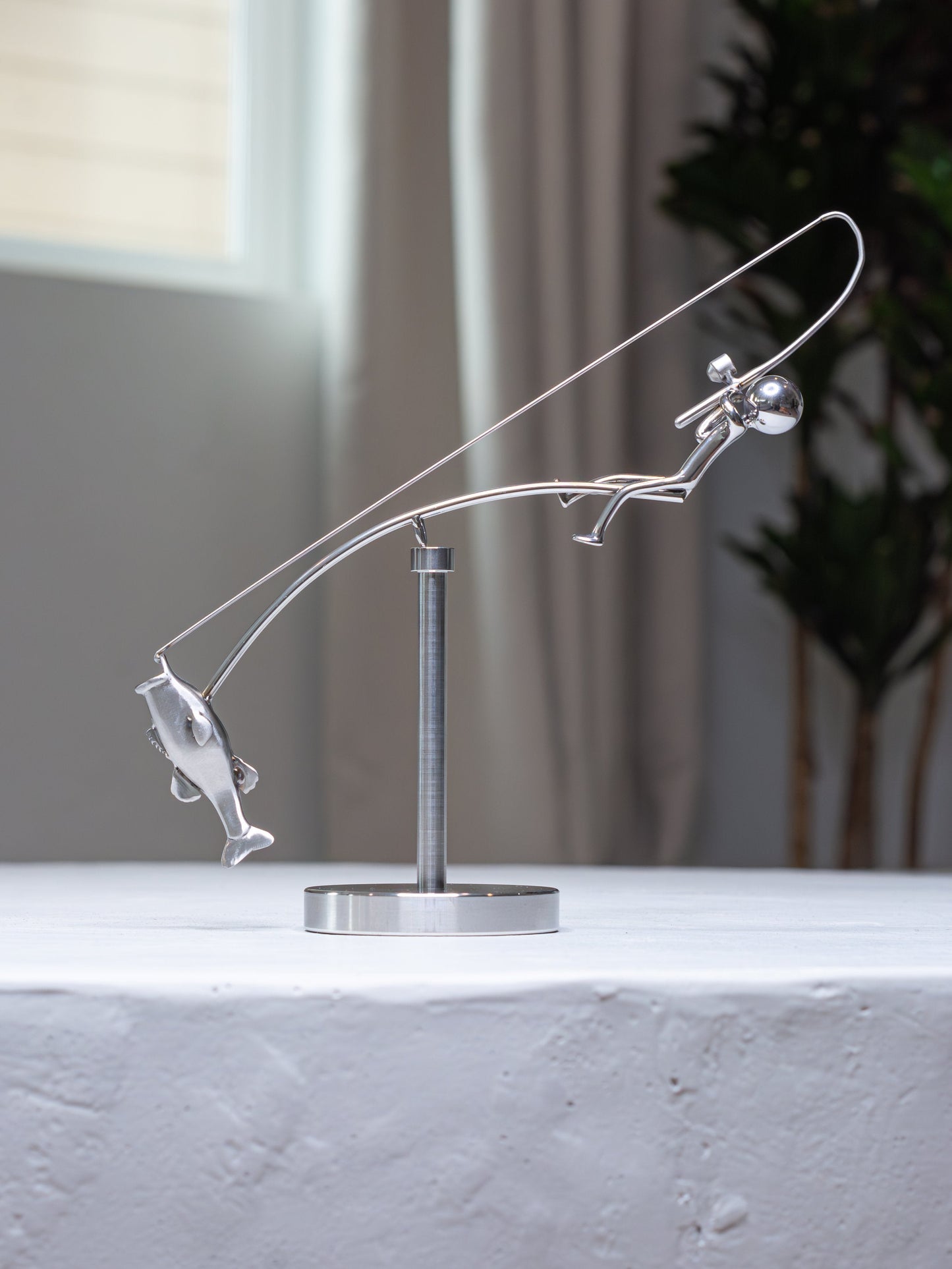 Kinetic Fisherman Sculpture
